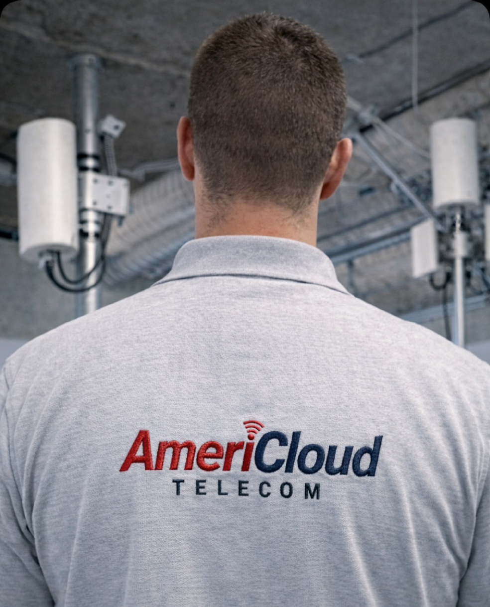 AmeriCloud technician beneath in-building antennas